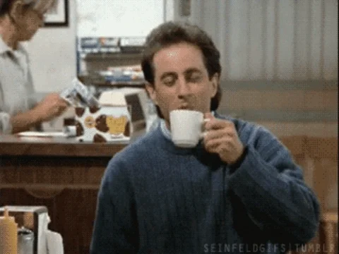 Jerry Seinfeild enjoying a cup of cofe