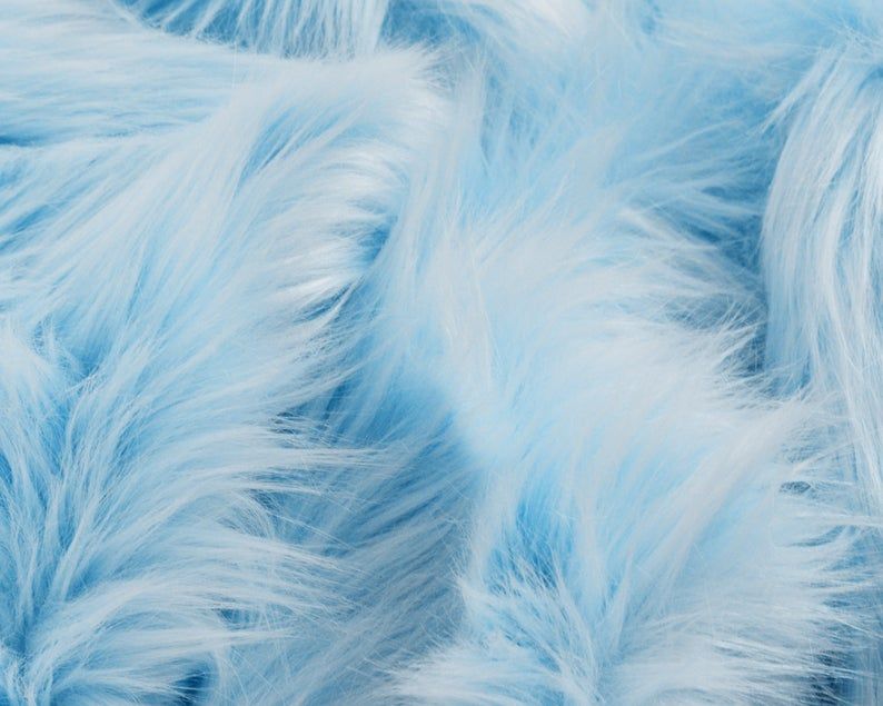 a very fluffy blue blanket